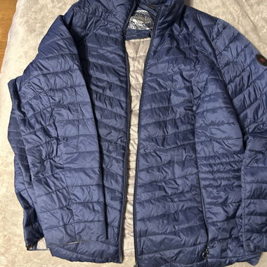 blue puffer jacket