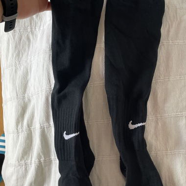 1x Adidas and 1x Nike high volleyball socks