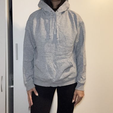 Pull a capuche HM taille S 