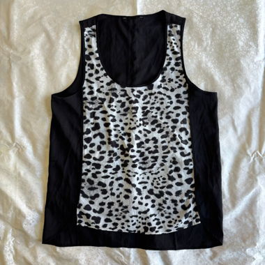“Split” snow leopard print top