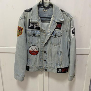 Very cool metal jeans jacket with many patches