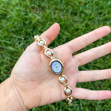 Orologio bracciale con perle dorate