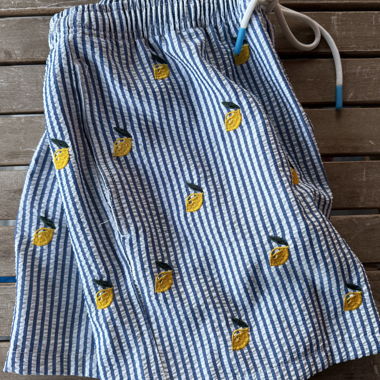 Striped swim trunks with lemons