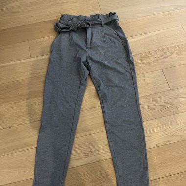 Grey women’s trousers with tie belt