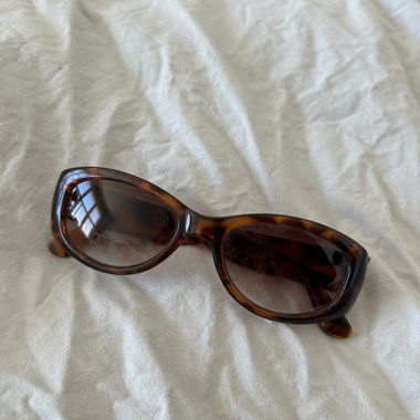 Gefleckte Sonnenbrille