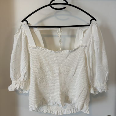 Top H&M bianco smock e maniche a sbuffo L