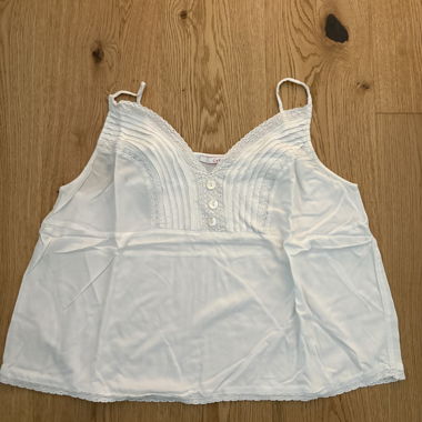 Top bianco a bretelle
