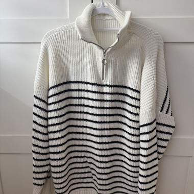 Sweater with fastening