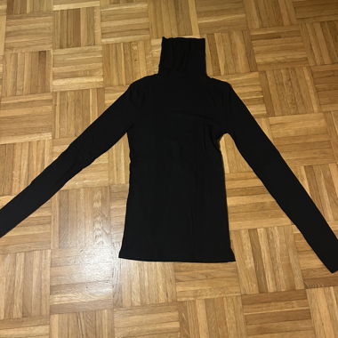 Black roll-neck sweater