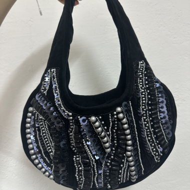 Black decorated hobo bag