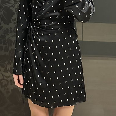 Black wrap dress with polka dots