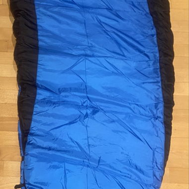 Blue/black sleeping bag, new