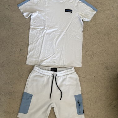 Set di pantaloncini e T-shirt abbinata di MCKENZIE