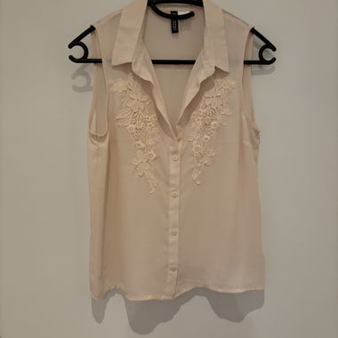 Blouse sans manches en dentelle