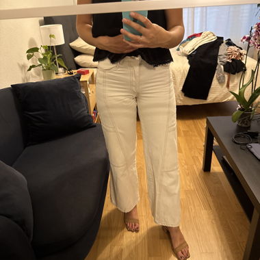 Jeans cargo bianchi a gamba larga