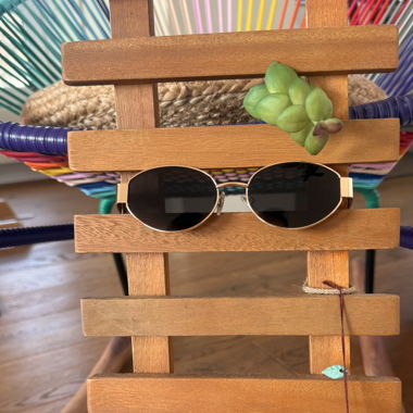 Lunettes de soleil ovales dorées