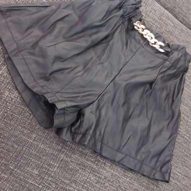 Black faux leather shorts