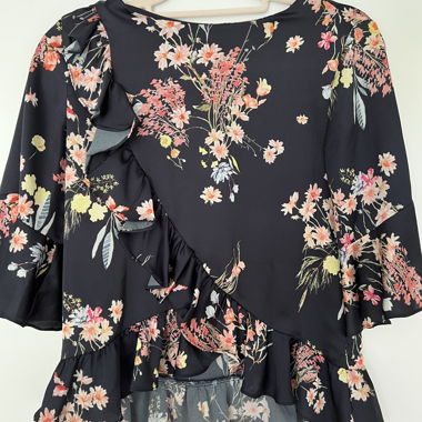 Blusa floreale nera