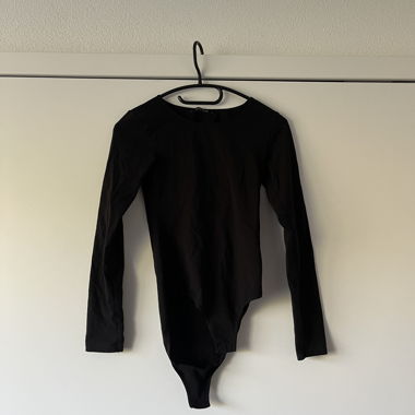 Black long-sleeve bodysuit