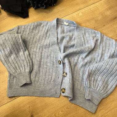 Light blue knitted cardigan