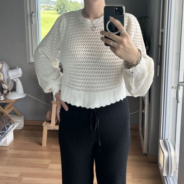 Pull court en maille blanche