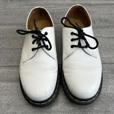 Dr. Martens white leather low-top shoes