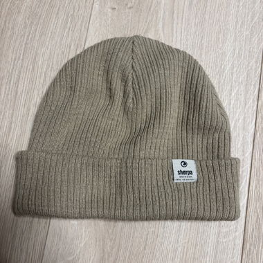 Bonnet beige en sherpa