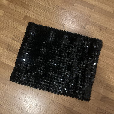 Clutch con paillettes nere