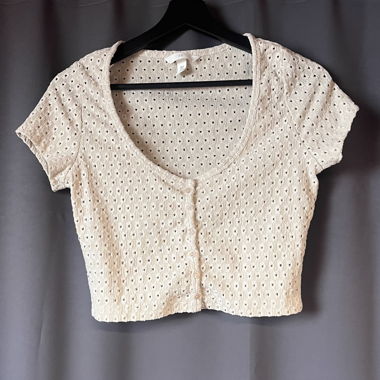 Cardigan in maglia beige manica corta