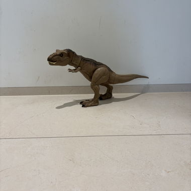 Dinosaurier-Spielzeugfigur braun