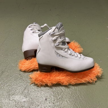 White ice skates with rhinestones