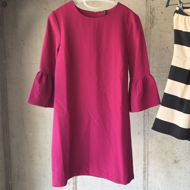 Pink dress with ruffled sleeves