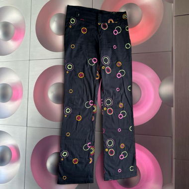 Pantalon vintage noir à broderies funky