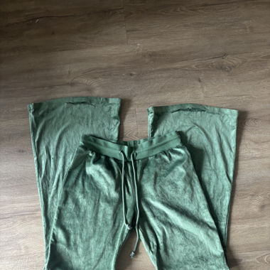 green subdued trackpants