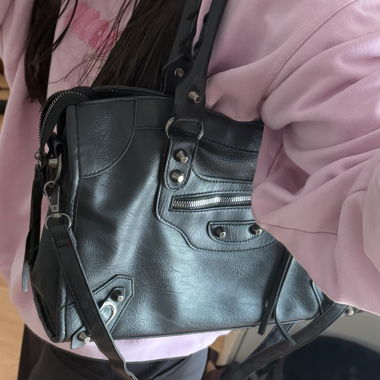 Black faux leather handbag