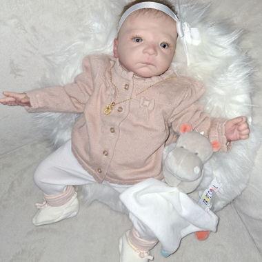 Reborn avec trousseau bébé