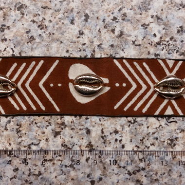 Wax and cowrie bracelet