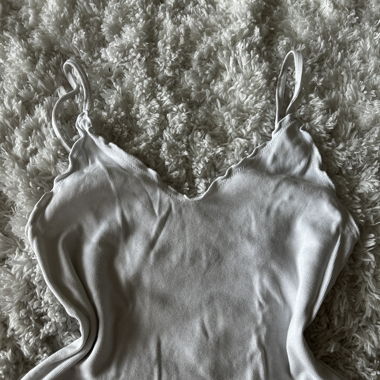 White ruffled crop top from Brandy Melville