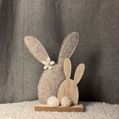 Decorative figurine rabbits made of wood and felt