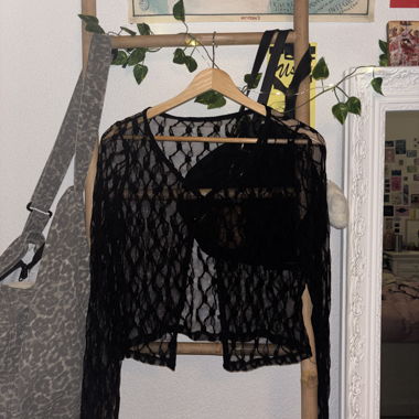 Cardigan corto in pizzo nero trasparente