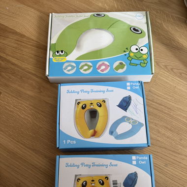 Folding toddler toilet seat