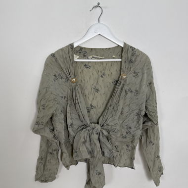 Blusa leggera con fiocco davanti floreale