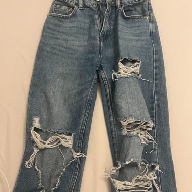 Jeans déchirés