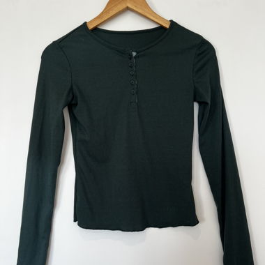 Dark long-sleeve shirt with button placket