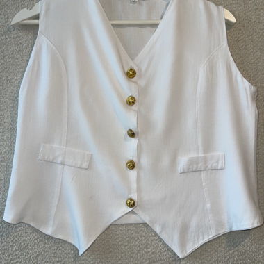 White waistcoat with gold buttons