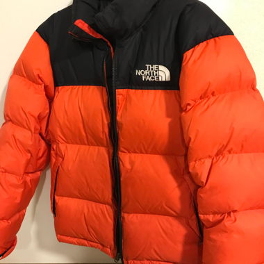 Piumino The North Face 700 arancione e nero