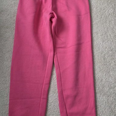 Pink sweatpants with elastic waistband