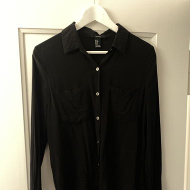 Bluse schwarz mit kleinen Taschen
