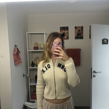 Cardigan zippé en maille côtelée