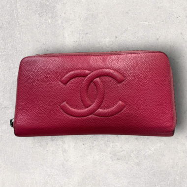 Pink zipped Chanel wallet